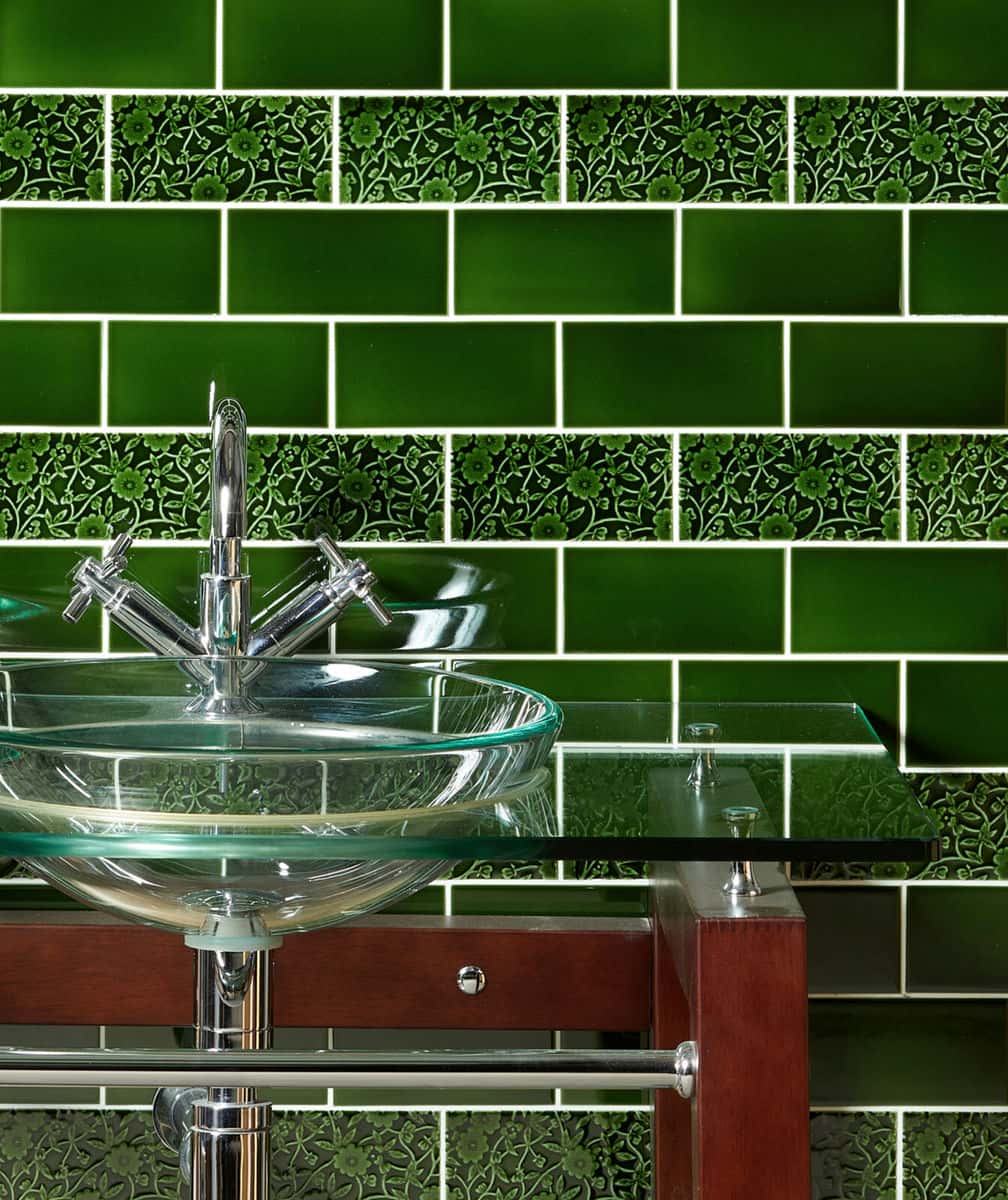 Green Victorian wall tiles in a bathroom