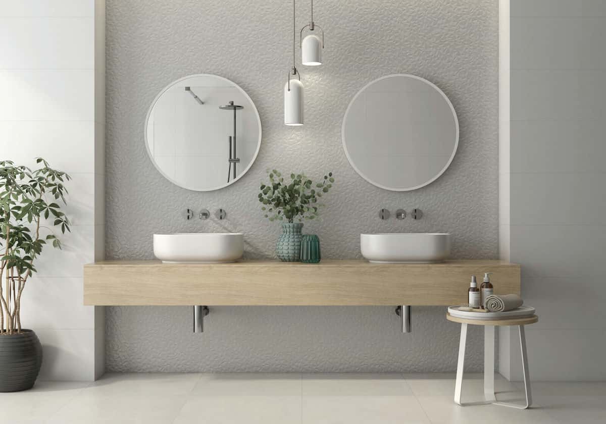 His and Hers sinks with round mirrors