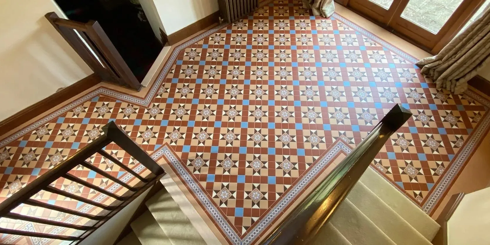 Intricate geometric period floor tiles